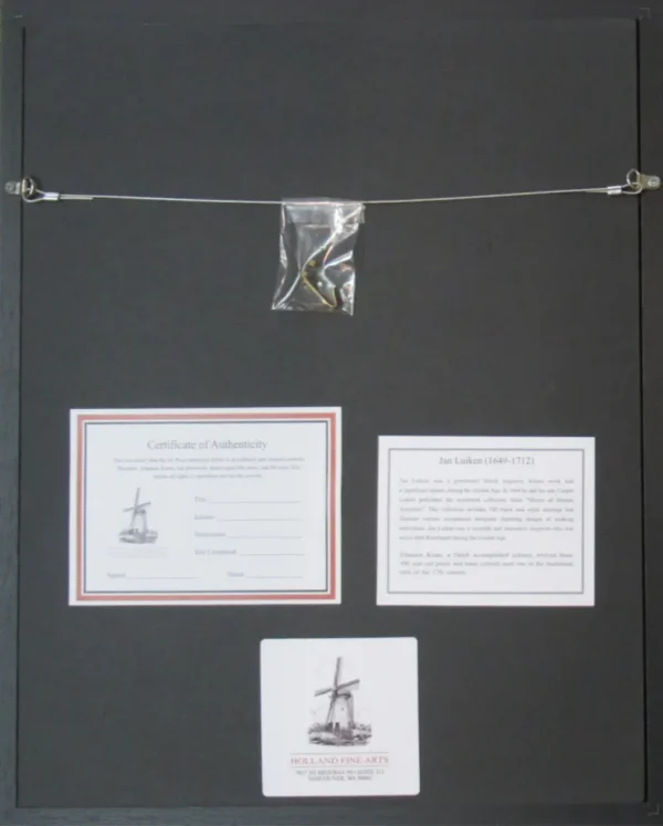 Back of a black-framed artwork with hanging wire, hardware, and a certificate of authenticity attached to the backing